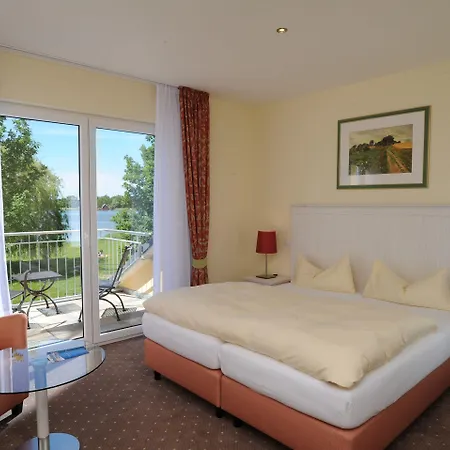 Отель Strandhaus Am Inselsee Гюстров